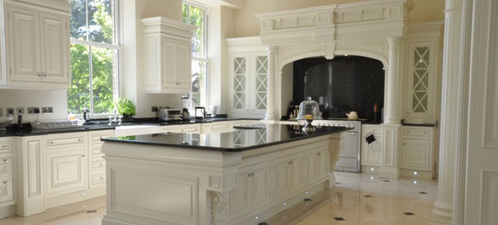 Hand painting a bespoke hand made kitchen - Russ Pike Interiors