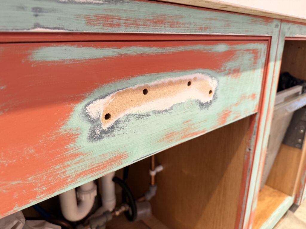 Filling holes in kitchen doors